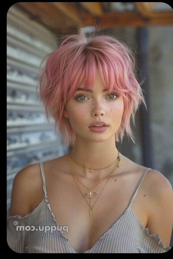 Soft Pink Shaggy Bob with Textured Bangs