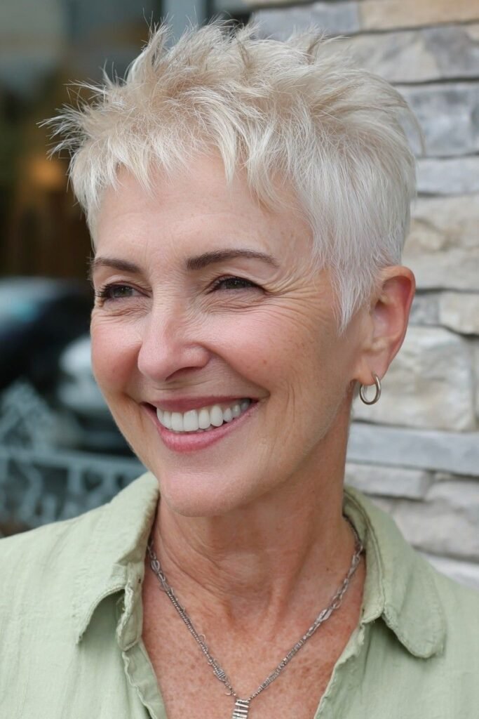 Spiky Silver Pixie Cut with Side-Swept Crown Texture
