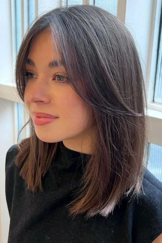Subtle Layered Lob with Face-Framing Strands