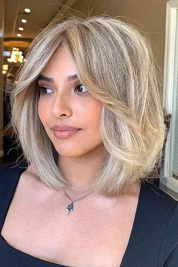 Textured Blonde Bob with Sweeping Curtain Bangs