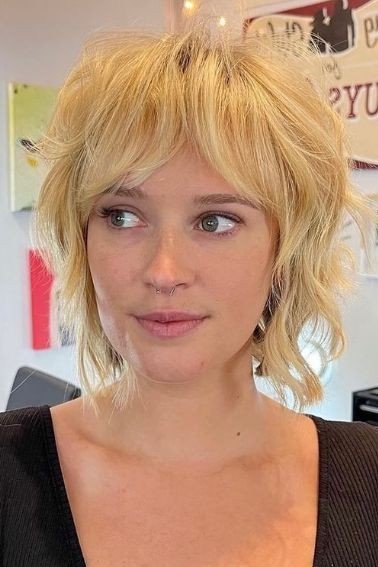 Textured Blonde Shaggy Bob with Curtain Bangs