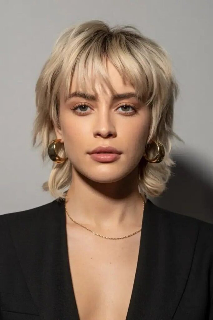 Textured Shag Haircut with Curtain Bangs