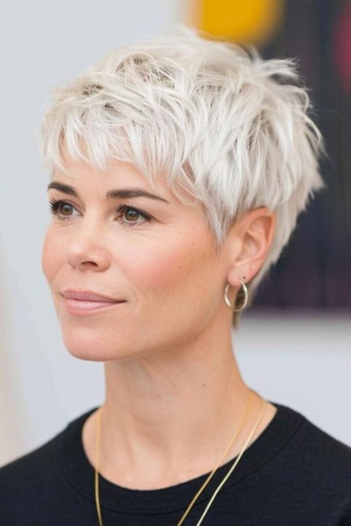 Textured White Blonde Pixie Cut with Feathered Layers