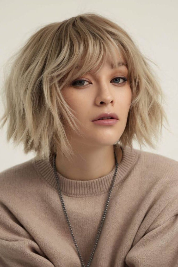 Tousled Blonde Bob with Layered Fringe