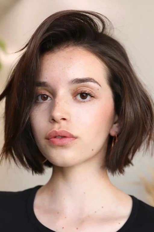 Tousled Dark Brown Bob with Side Swept Layers