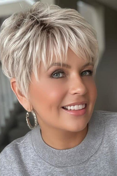 Tousled Platinum Blonde Pixie Crop with Textured Fringe