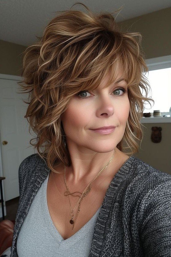 Tousled Shaggy Bob with Caramel Highlights and Bangs
