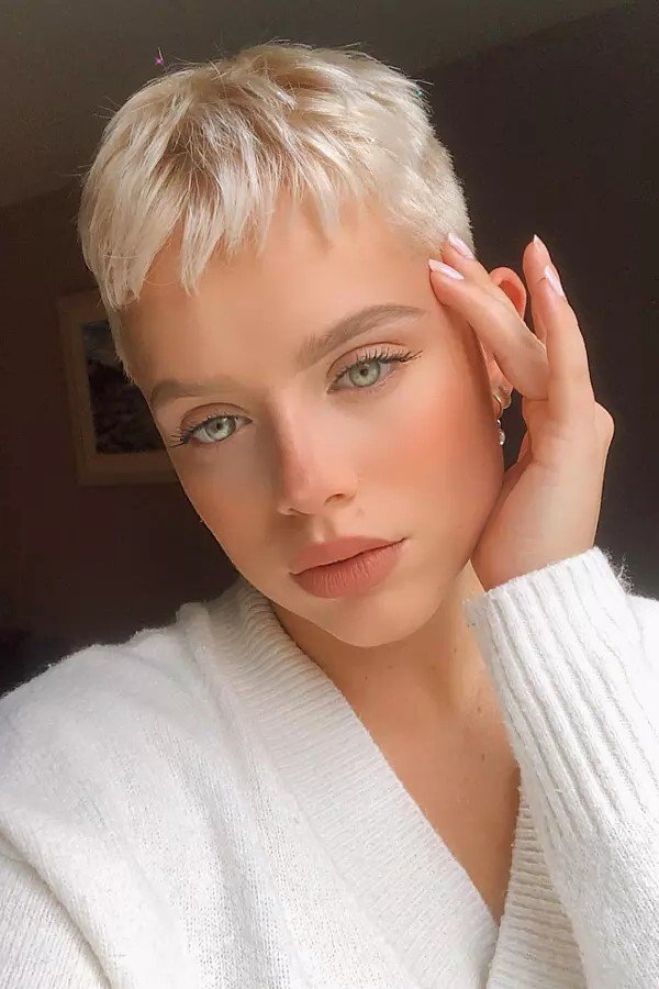 Ultra-Short Platinum Blonde Buzz Cut with Textured Fringe