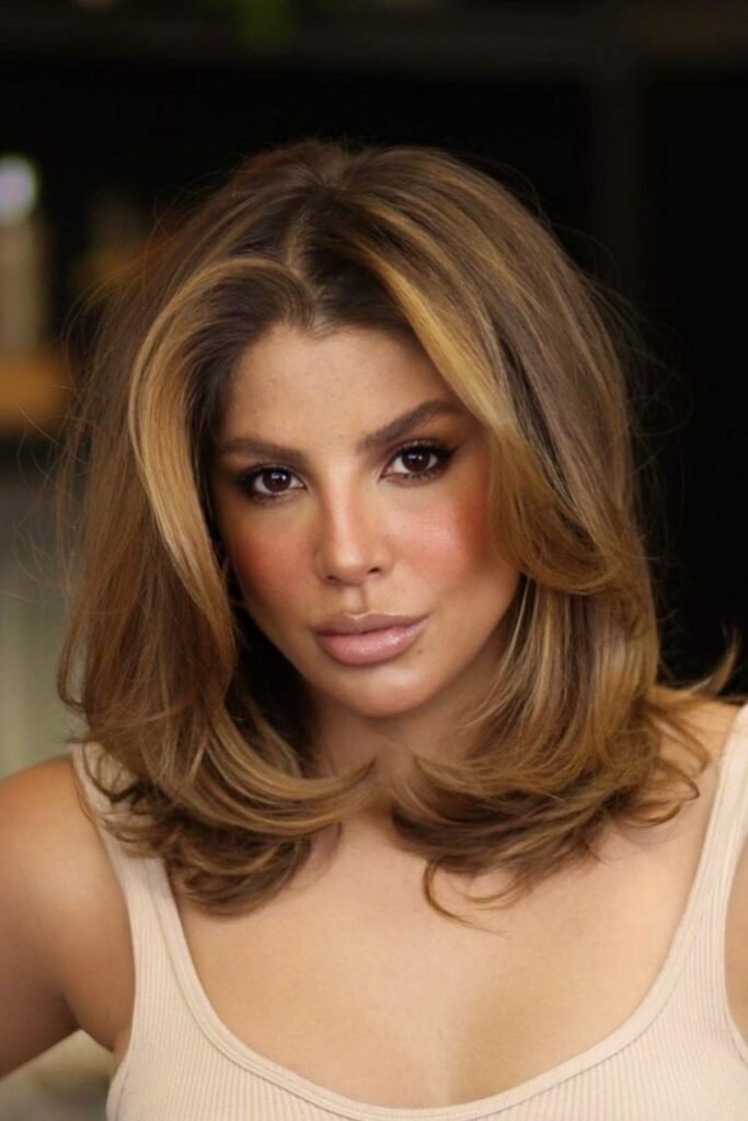 Voluminous Layered Lob with Caramel Tones