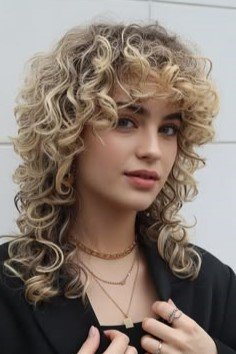 Blonde Curly Shag with Soft Voluminous Bangs