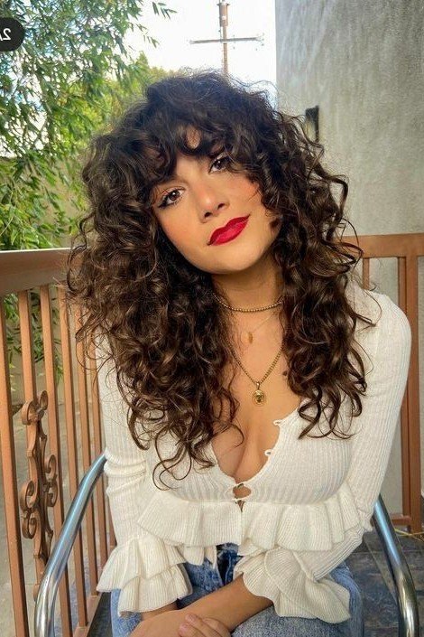 Bouncy Curly Shag with Voluminous Fringe