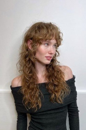 Caramel Curly Shag with Side-Swept Fringe