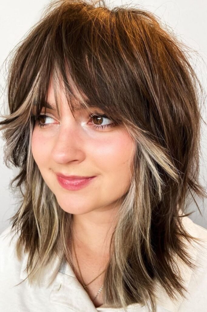 Choppy Brown Shag with Chunky Blonde Highlights