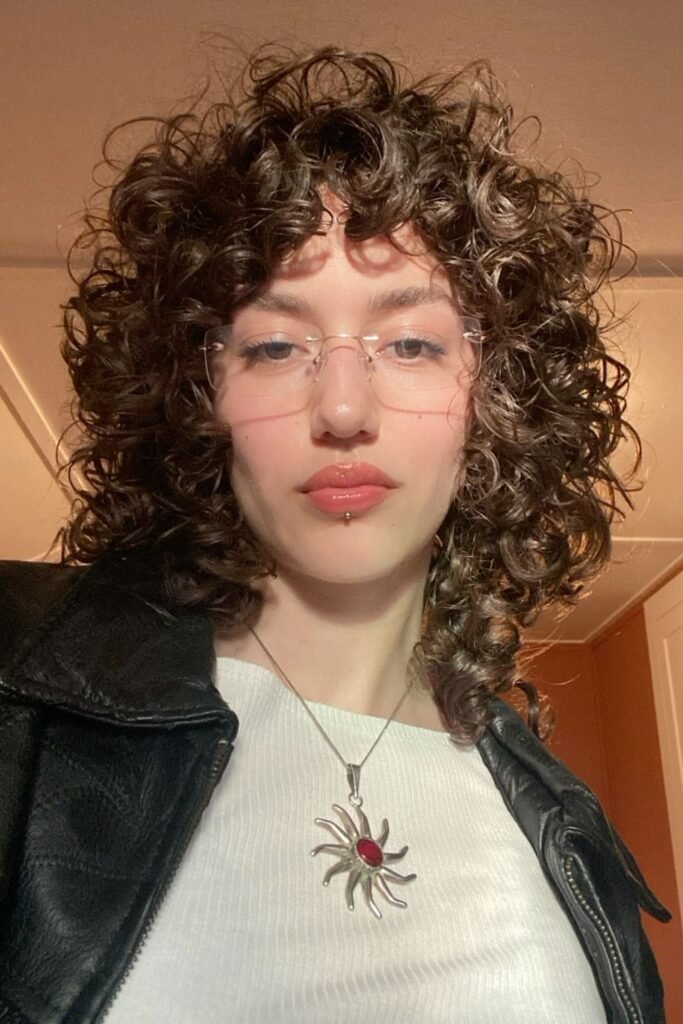 Curly Shag with Voluminous Fringe and Layers
