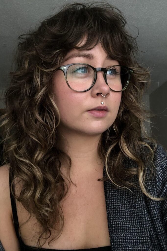 Dark Brown Shag with Blonde Highlights and Glasses