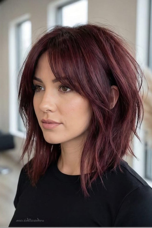 Dark Burgundy Shaggy Bob with Side-Swept Bangs