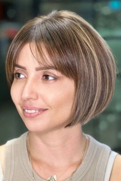Highlighted Sleek Bob with Wispy Bangs