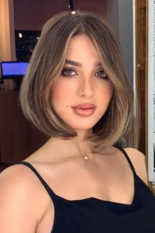 Layered Bob with Bold Face-Framing Highlights