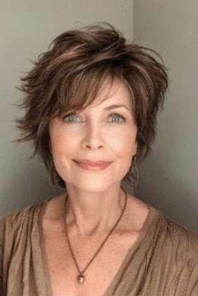 Layered Brunette Shag with Side-Swept Bangs