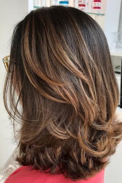 Medium Layered Hair with Face-Framing Highlights