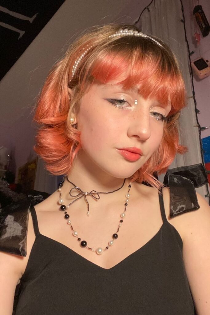 Peach-Toned Wavy Bob with Pearl Headband