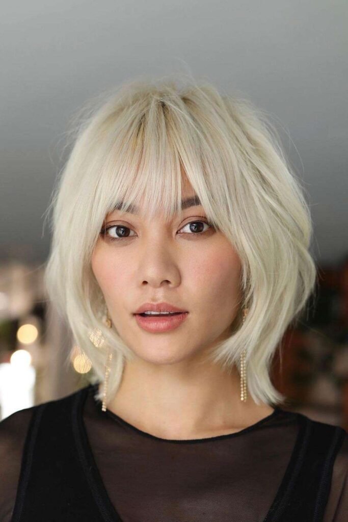Platinum Blonde Shag with Straight Bangs
