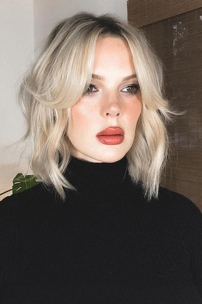 Platinum Blonde Shaggy Bob with Curtain Bangs