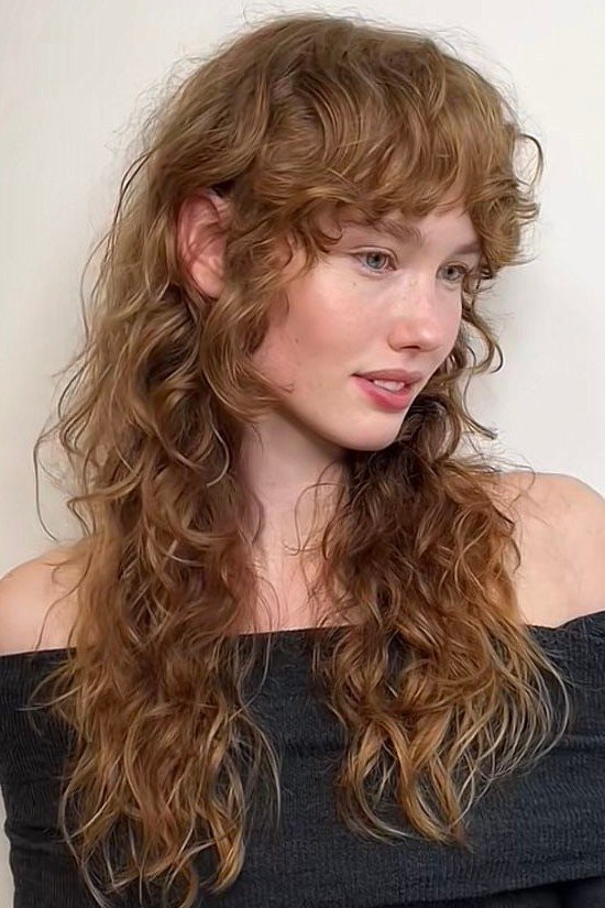 Reddish-Brown Shag with Soft Curtain Bangs