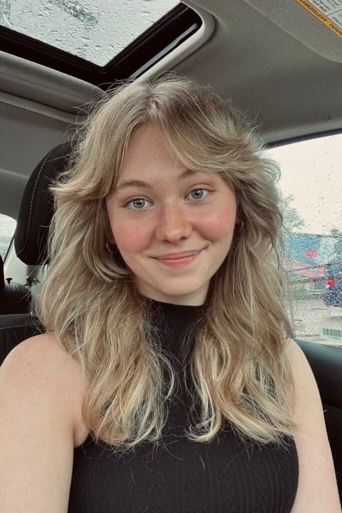 Shaggy Layers with Soft Curtain Bangs