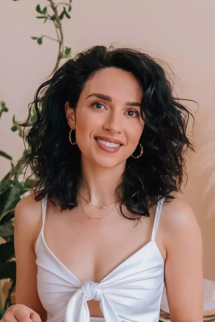 Shoulder-Length Dark Curls with Volume