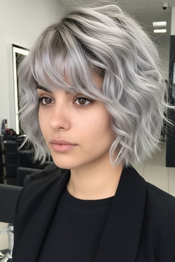 Silver-Grey Wavy Bob with Side-Swept Bangs