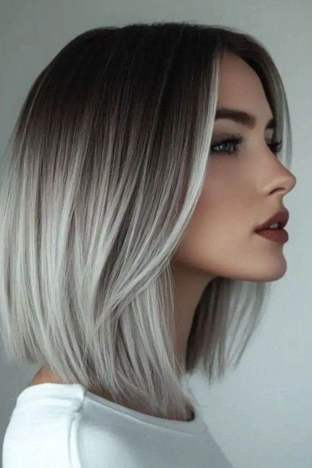 Sleek Bob with Dark Roots and Platinum Face-Framing Highlights