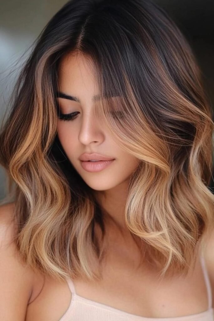 Soft Layered Waves with Warm Honey Balayage