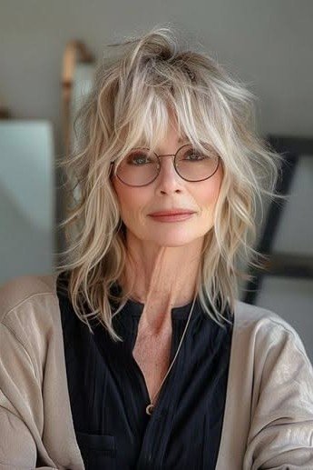Textured Ash Blonde Shaggy Bob with Soft Wispy Bangs