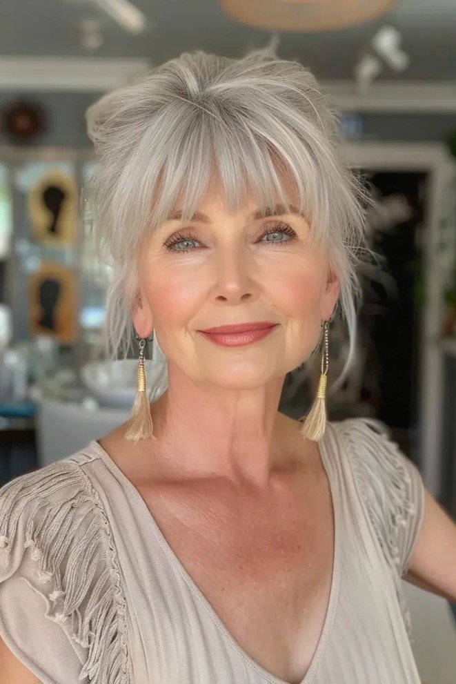 Updo Hairstyle with Bangs and Face-Framing Pieces