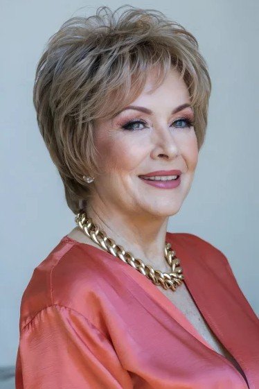 Voluminous Ash Blonde Choppy Bob with Layered Crown