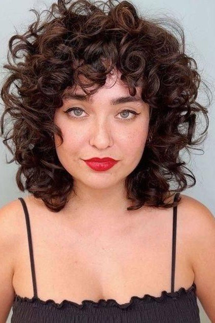 Voluminous Curly Shag with Defined Ringlets