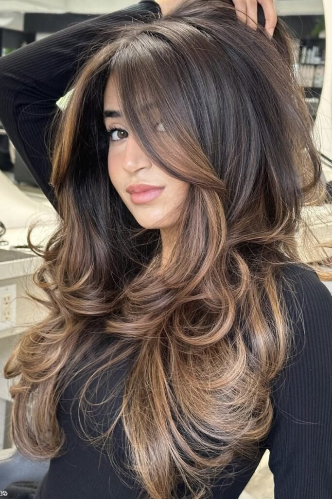 Voluminous Layered Hair with Side-Swept Bangs