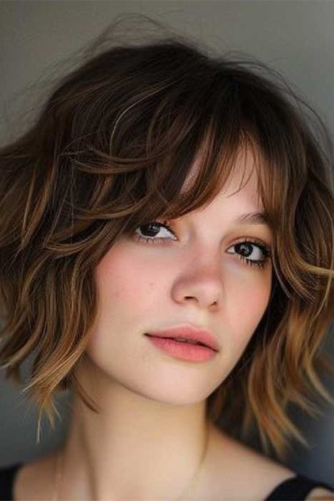 Wavy Layered Bob with Warm Highlights